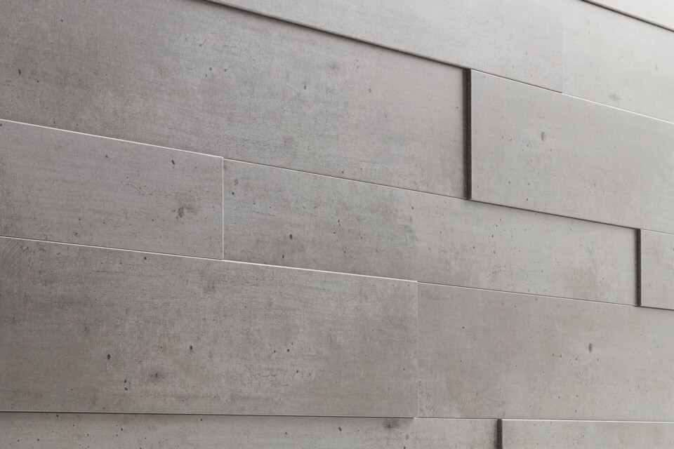 Wandpaneele in Steinoptik und mit 3-D-Effekt an der Wand verlegt 